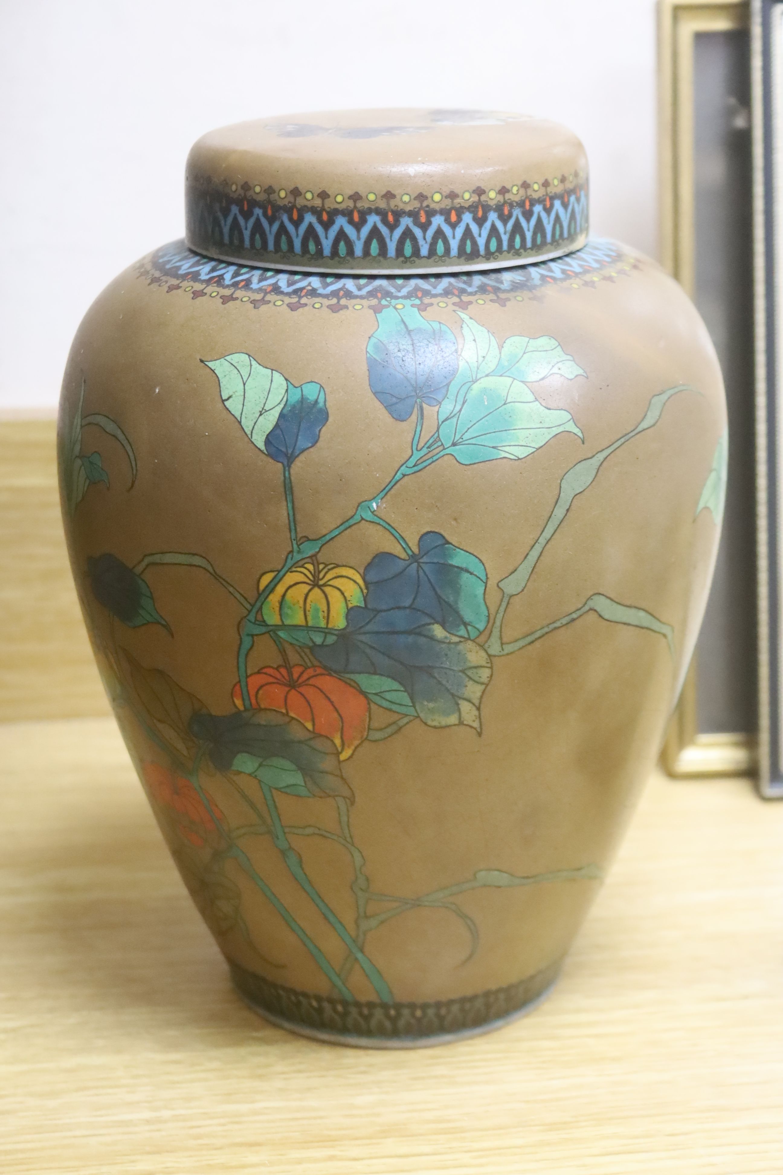 A jar and cover, height 26cm, a Satsuma vase, a cup and saucer and a tile